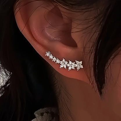 BRINCOS DOURADOS FLORAIS COM CRISTAIS RHINESTONE