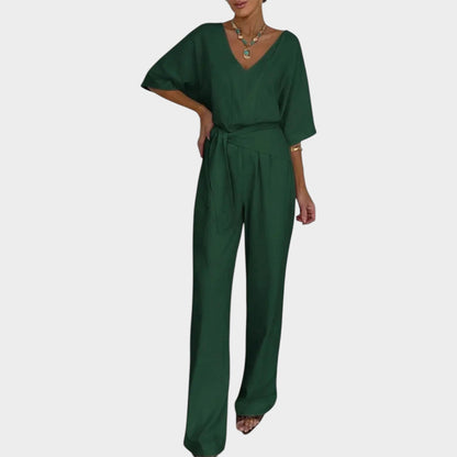 Vivienne | V-hals jumpsuit med bælte og vide ben