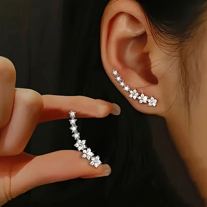 BRINCOS DOURADOS FLORAIS COM CRISTAIS RHINESTONE