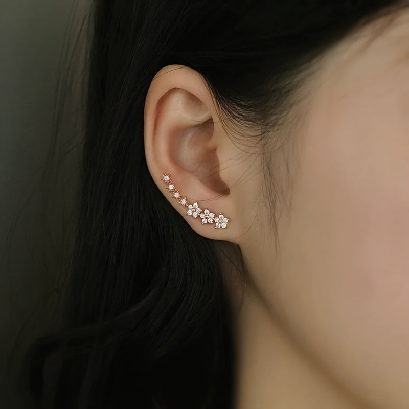 BRINCOS DOURADOS FLORAIS COM CRISTAIS RHINESTONE