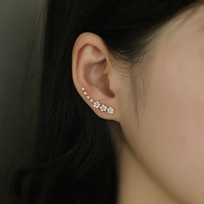 BRINCOS DOURADOS FLORAIS COM CRISTAIS RHINESTONE